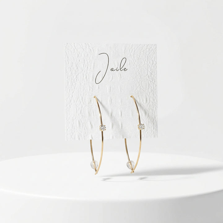 ABSTRACT LEAF SHAPED EARRINGS WITH SINGULAR STONE