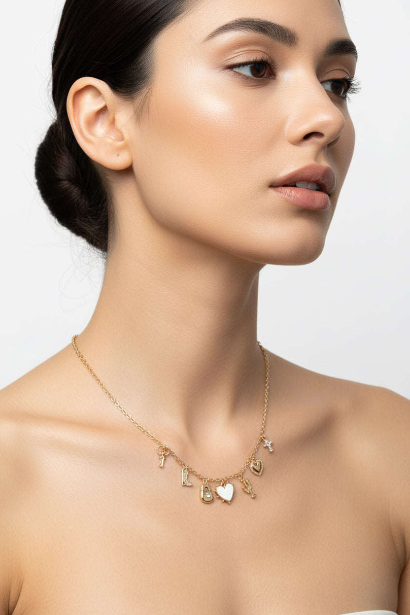 GOLD WESTERN CHARM NECKLACE WITH WHITE HEART CENTER