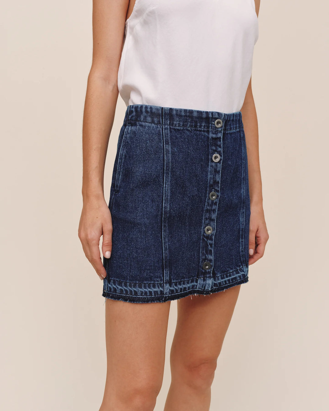 BUTTON FRONT MINI SKIRT WITH RELEASE HEM