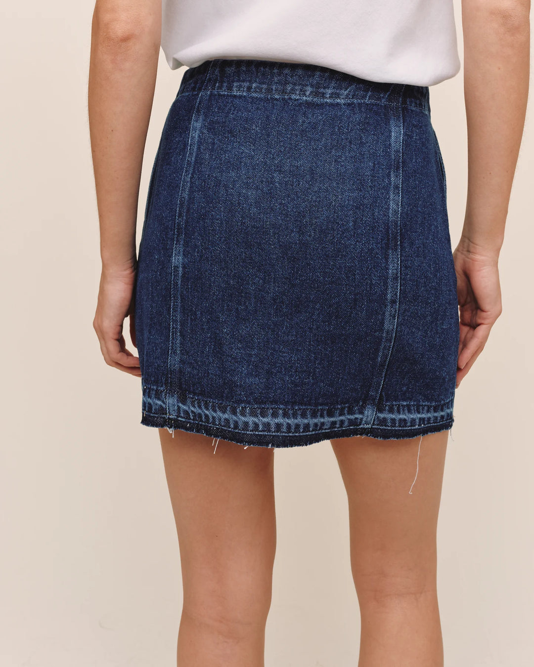 BUTTON FRONT MINI SKIRT WITH RELEASE HEM