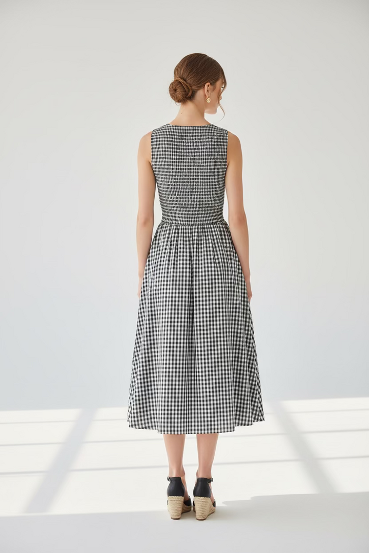SLEEVELESS SMOCKED GINGHAM PRINT DRESS