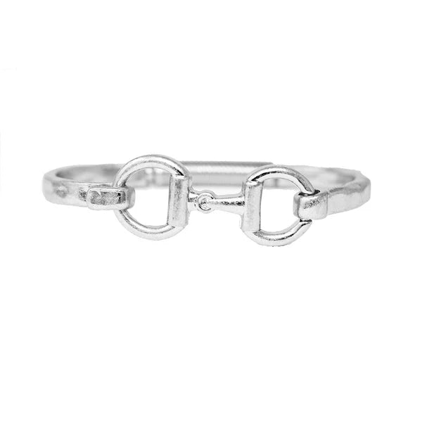 WORN HINGED BRACELET WITH HORSE BIT CLOSURE